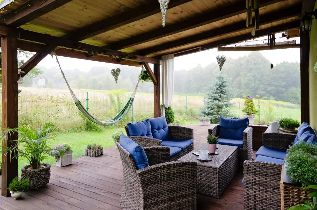 Outdoor patio furniture in a backyard before being stored for fall